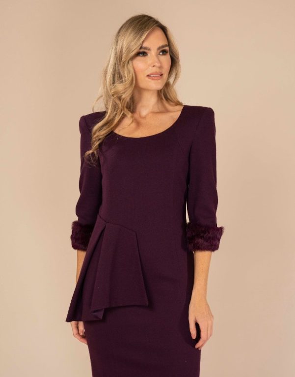 A 100% wool flattering midi length dress with raised asymmetrical neckline